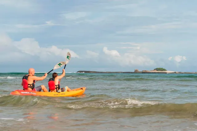 Travelers enjoying kayak trip in Guanacaste